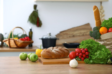 Kitchen interiors. Many vegetables and other meal are ready for been cooked soon