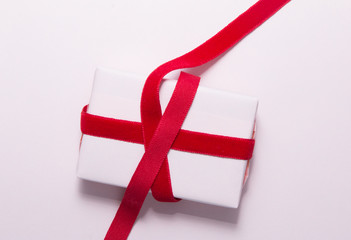 Red ribbon with gift box