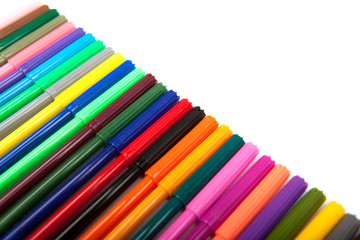 lots of assorted colors marker pens isolated on white background