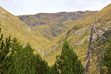 Escape to the Pyrenees from dawn to dusk Set of panoramic images of the Pyrenees from the sunrise to the sunset, where we can appreciate: meadows, mountains, rivers, villages, houses. © JosepIgnasi