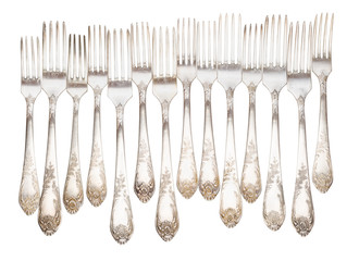 Vintage silver forks isolated in row