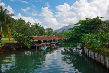 Naklejka premium Fishing village on the island in Southeast Asia