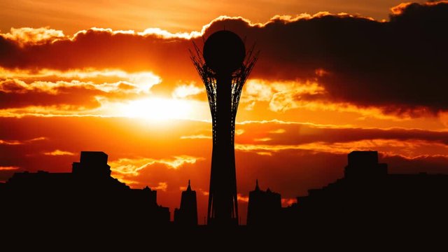 Timelapse of silhouette Bayterek tower in Astana capital of Kazakhstan on beautiful sunset