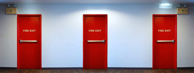 Emergency fire exit door red color.