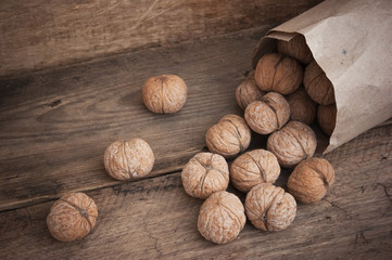 walnuts in a kraft paper bag