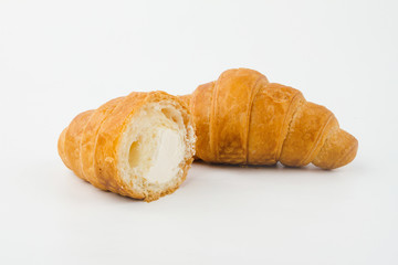 Delicious croissants with cherry jam on a white background