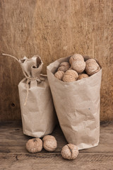 walnuts in a kraft paper bag