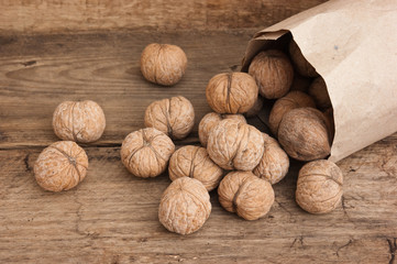 walnuts in a kraft paper bag