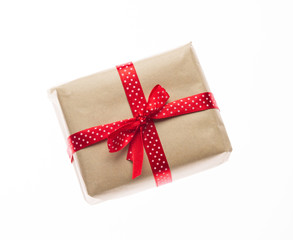 Gift box with ribbon on white