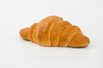 Delicious croissants with cherry jam on a white background