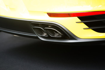 Close up on sport car exhaust pipe