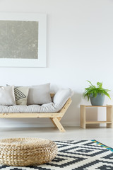 Minimalist living room with pouf