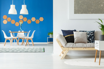 Blue open space with sofa