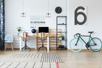 Spacious workspace with bike