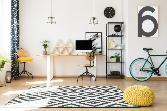 Yellow Pouf In Work Area