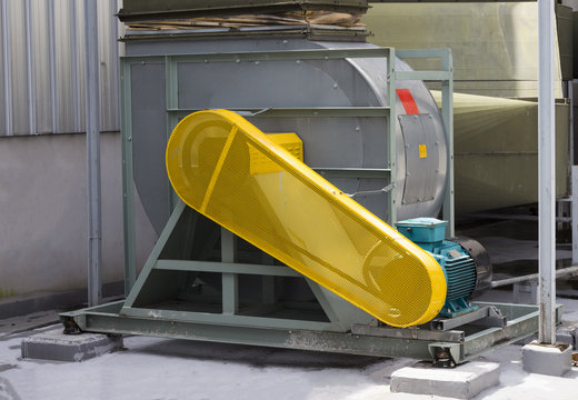 Yellow belt guard safety protection of motor ;  prevent part of body  touch into ; air duct  blower machine ; industry equipment background