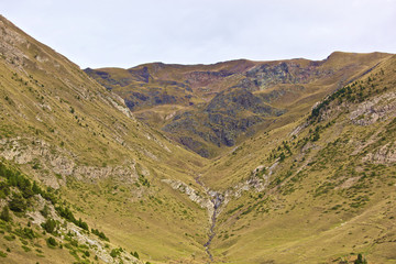 Escape to the Pyrenees from dawn to dusk Set of panoramic images of the Pyrenees from the sunrise to the sunset, where we can appreciate: meadows, mountains, rivers, villages, houses. © JosepIgnasi