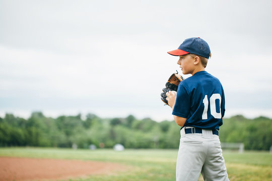 Pitcher about to throw a baseball