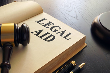 Legal aid written in a book. Advice concept. 
