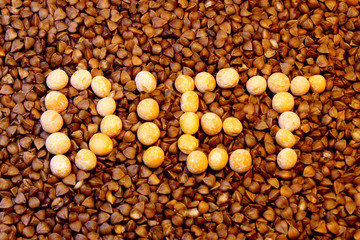 The word diet laid out with peas on buckwheat