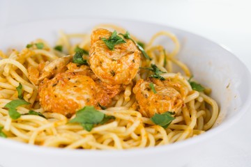 Spaghetti with chicken meat and cream sauce