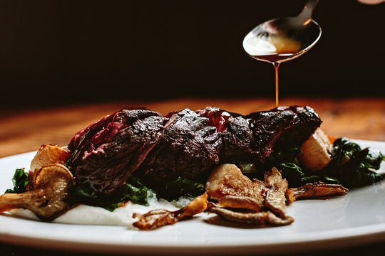 steak being sauced - digital file