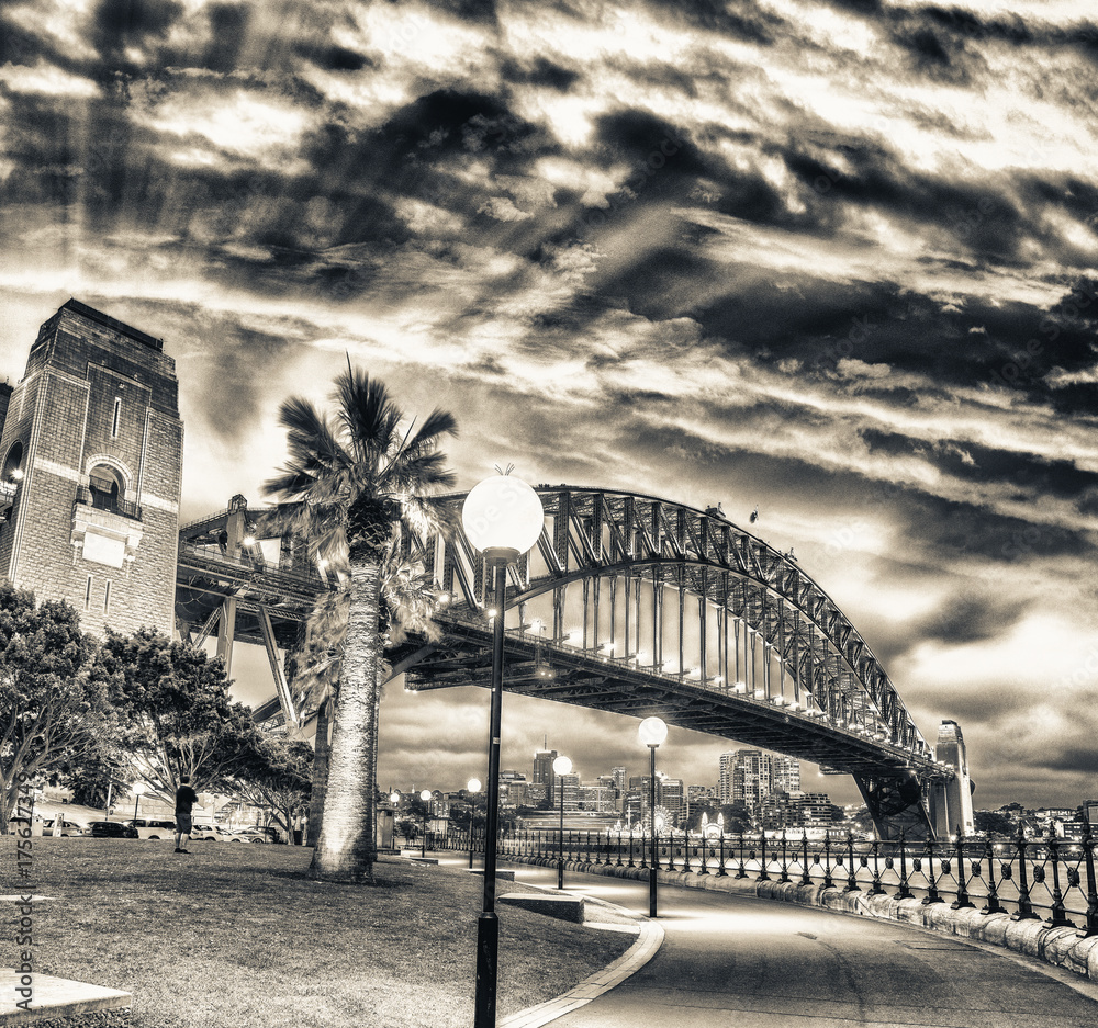 Wall mural Beautiful view of Sydney Harbour Bridge with sunset sky, Australia