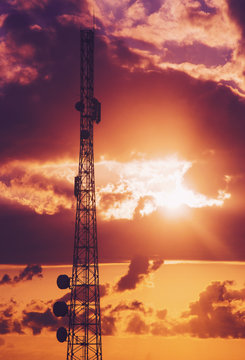 Telecommunication tower during dramatic sunrise