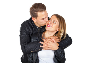 Happy couple cuddling and kissing