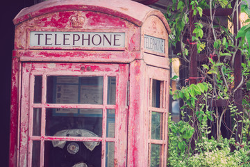 Obraz premium Abandoned British red public telephone box.