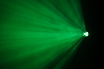 Rays theatrical spotlights on the stage during the performance. Lighting equipment. The lighting designer. Theatrical smoke. The art and creativity.