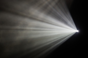 Rays theatrical spotlights on the stage during the performance. Lighting equipment. The lighting designer. Theatre arts