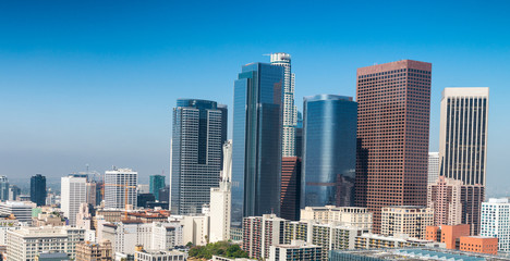 Downtown skyscrapers on a sunny day, Los Angeles is often known by its initials L.A.