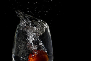 splashing in a glass