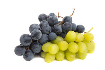 Black and green grapes isolated on white background