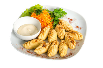 Mongolian national dish - fried dumplings isolated on white