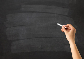 Naklejka premium Hand holding chalk