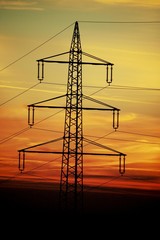Power masts in the afterglow