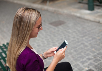 Young woman looking at phone