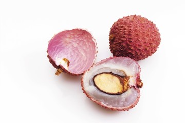 Lychees (Litchi chinensis), one halved