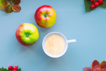 Coffee in a white mug on a blue background