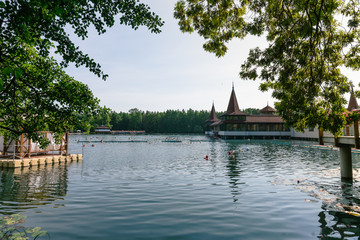 Obraz premium HEVIZ, HUNGARY. The Heviz Spa and bathers in Hungary. Lake Heviz is the 2nd largest natural thermal lake in the world.