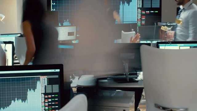  Timelapse of city stockmarket traders, at work in a chaotic trading room