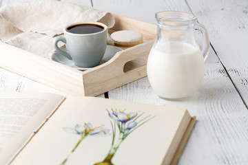 Home Interior with Coffee cup Books on table wooden tray