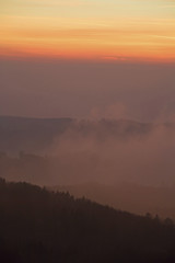 Wafts of mist at sunset