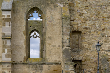 Empty window openings in a church ruin. Belleer Kirche Church in Eckelsheim Rhineland-Palatinate, Germany. Rhine-Hesse.