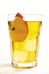 Apple juice garnished with an apple slice