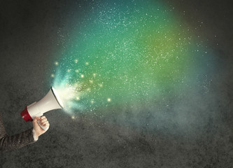 Hand holding megaphone