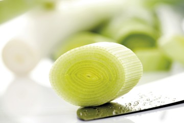 Leek (Allium ampeloprasum) slice on a knife