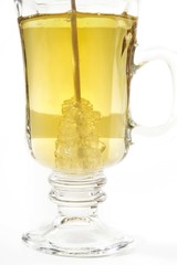 Tea in a tea glass and rock candy